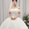 Lynora - Off-shoulder ball gown with corset wedding dress