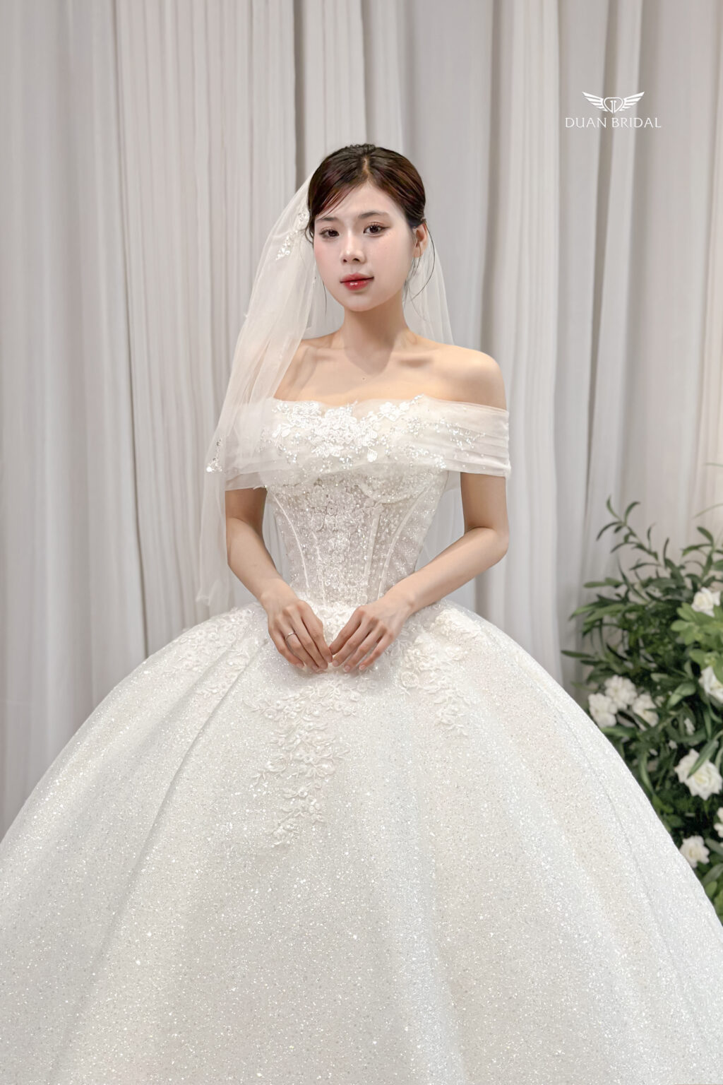 Lynora - Off-shoulder ball gown with corset wedding dress