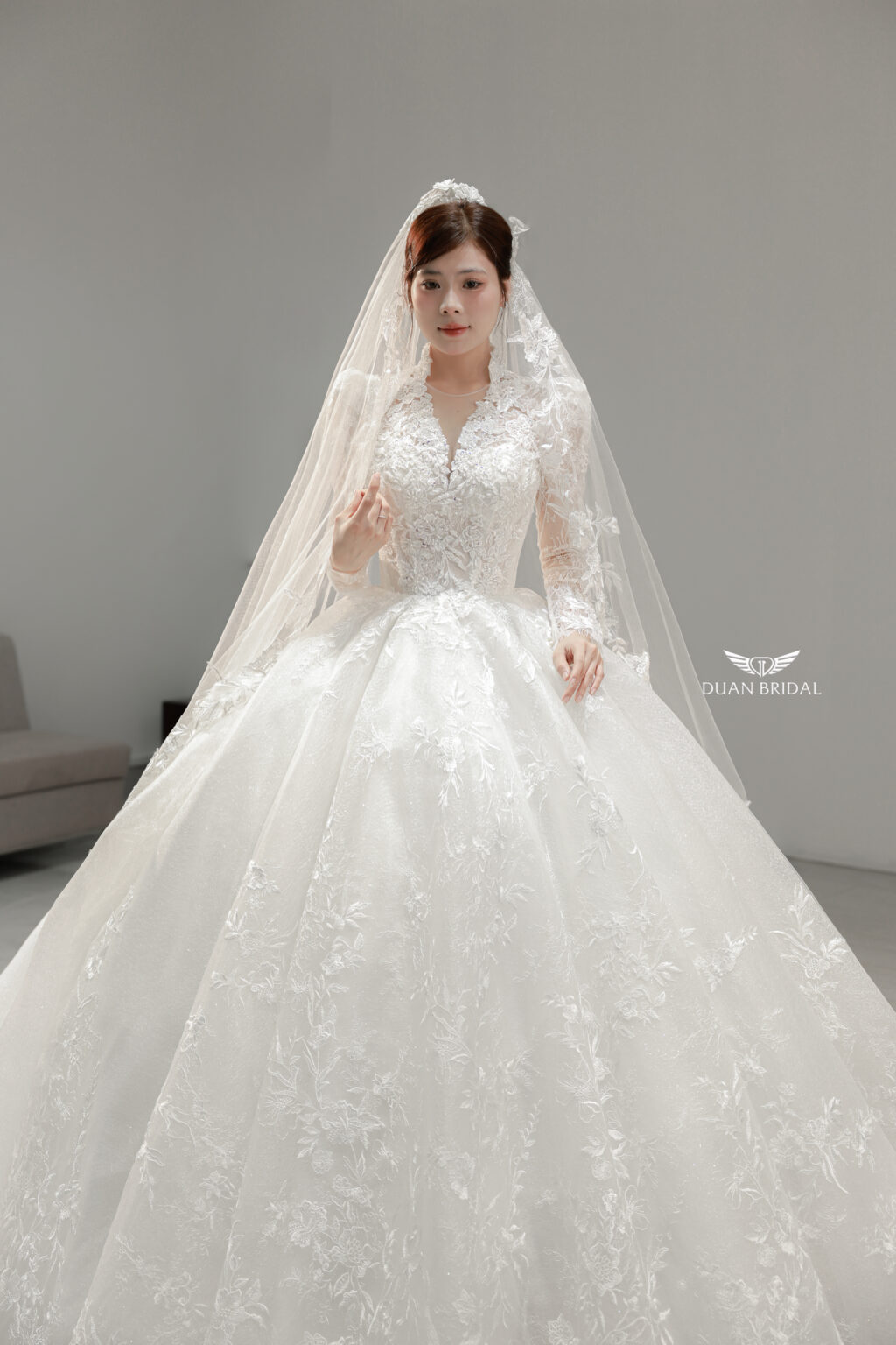 Vienna Glow - Long sleeve floral lace ball gown wedding dress