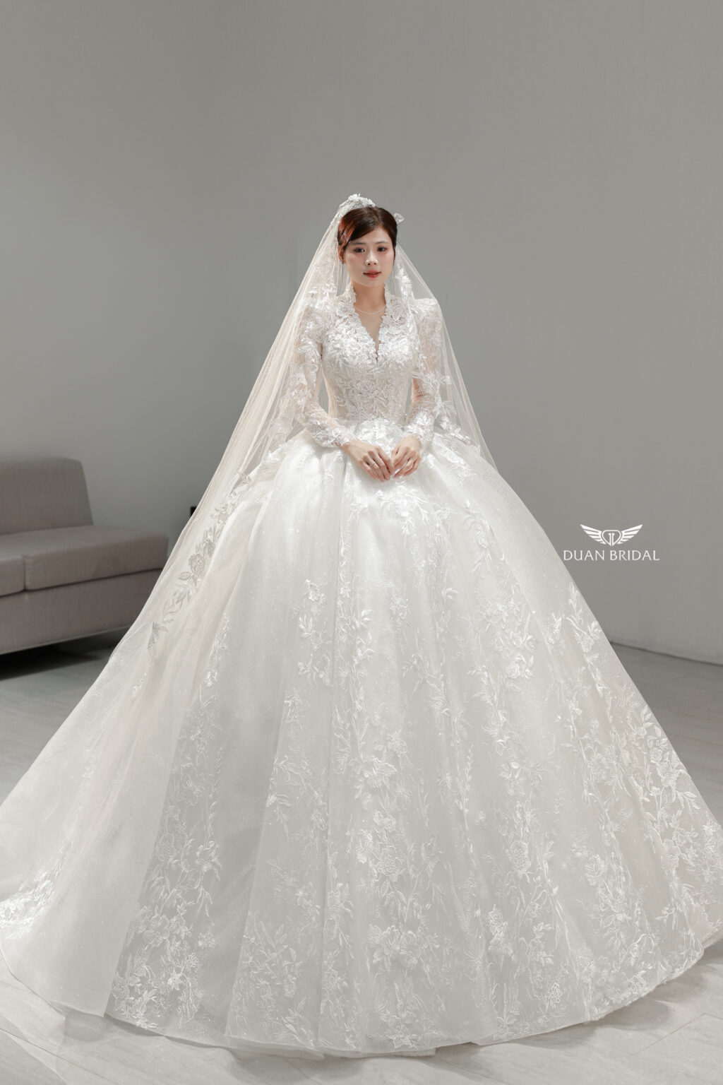 Vienna Glow - Long sleeve floral lace ball gown wedding dress