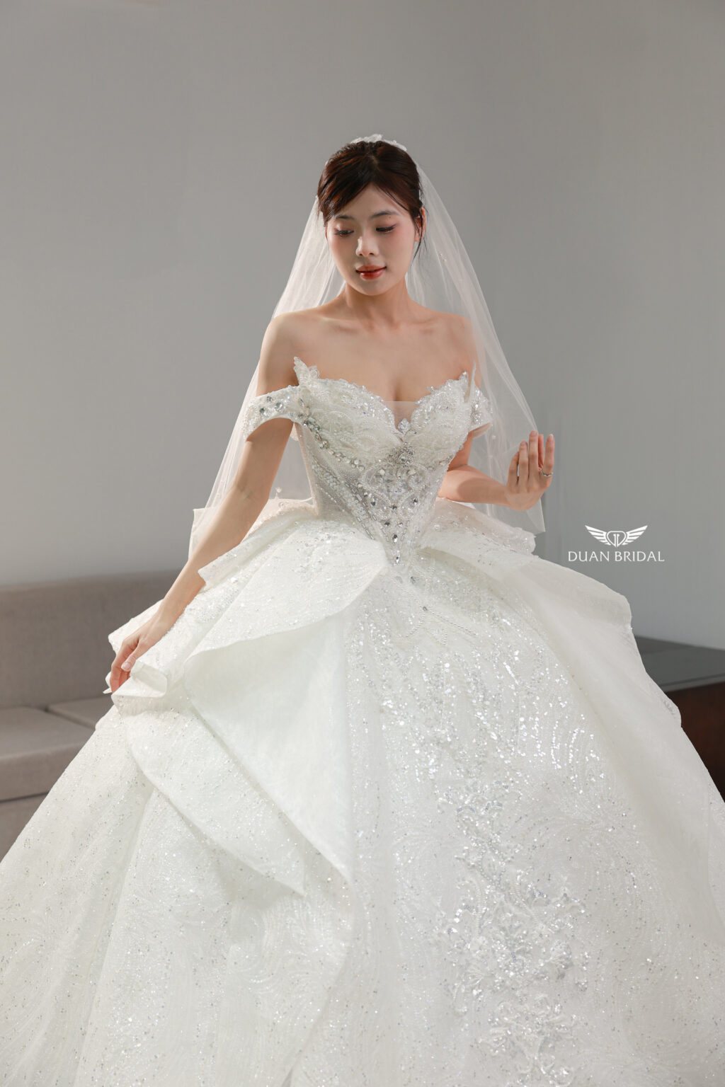 Off-shoulder rhinestone ball gown wedding dress 3